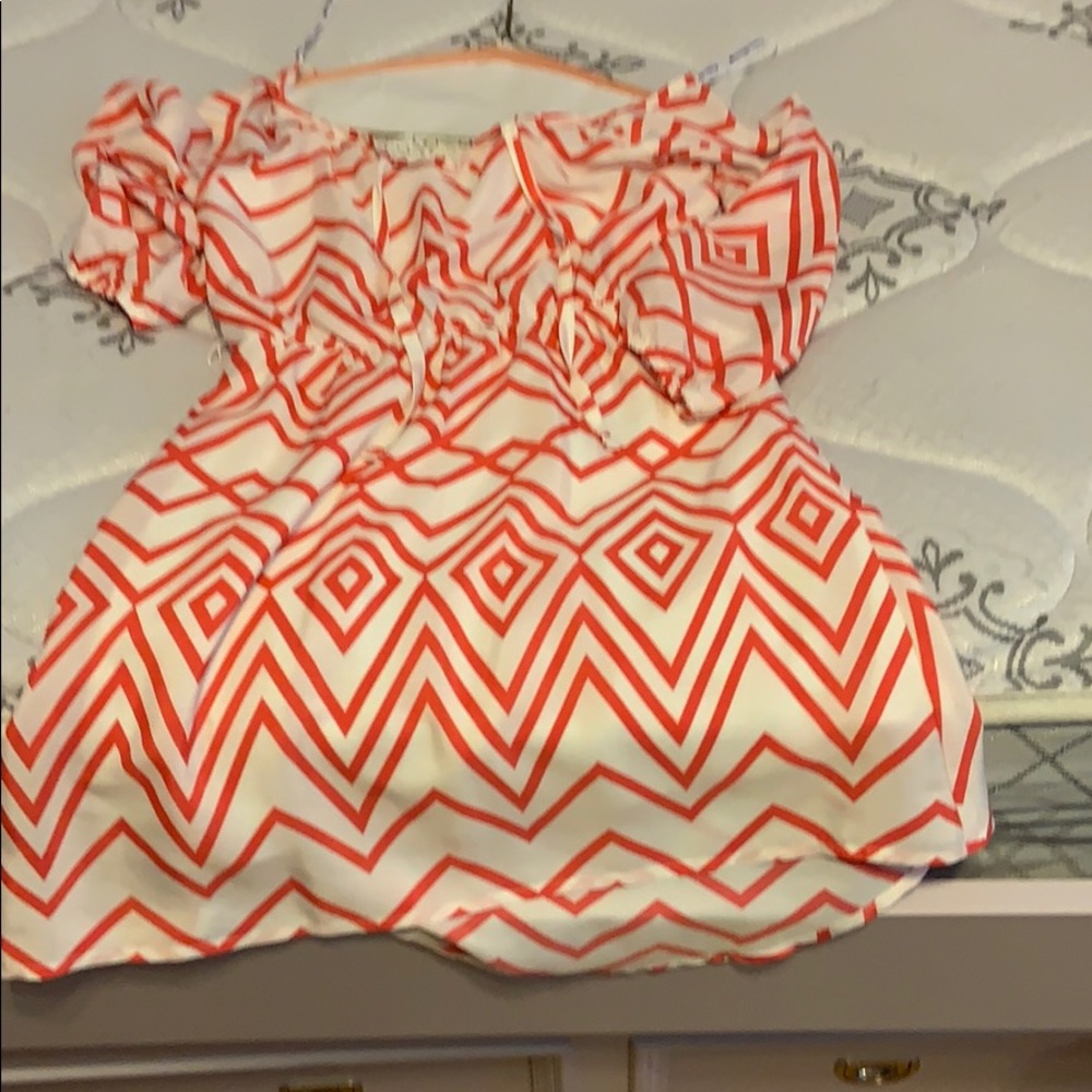 pink and white pattern dress